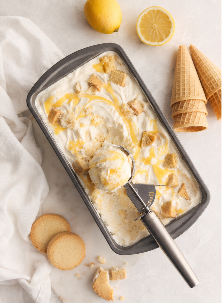 Creamy lemon bar ice cream with lemon curd swirls and shortbread cookie pieces