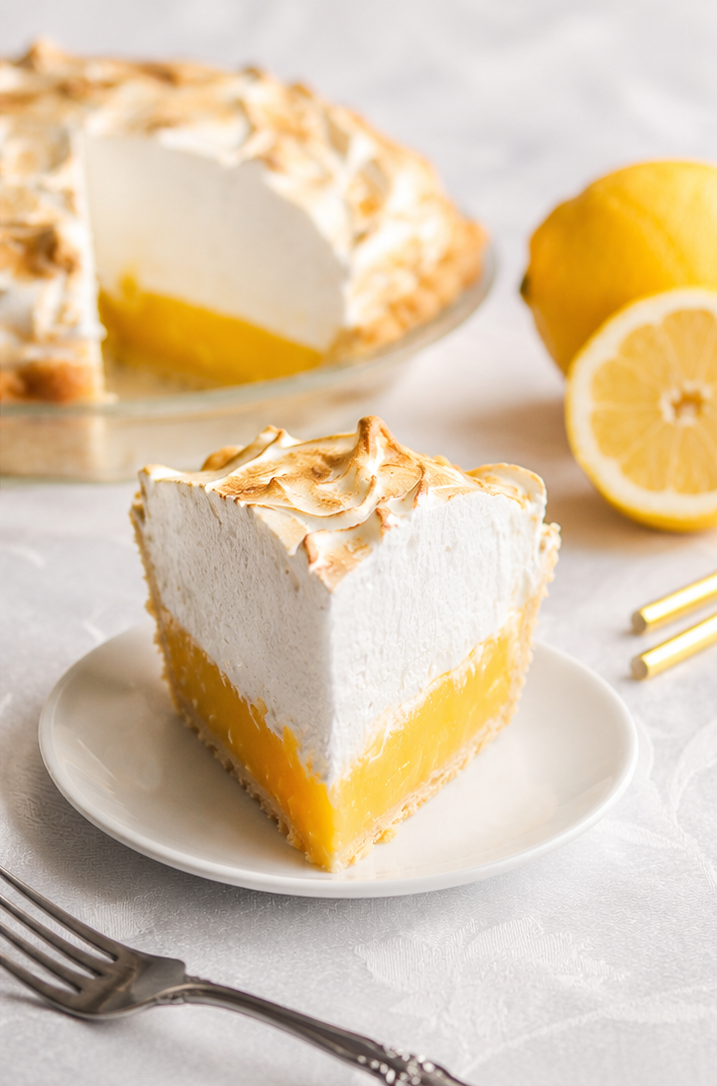Classic lemon meringue pie with flaky crust, tart lemon filling, and toasted Italian meringue