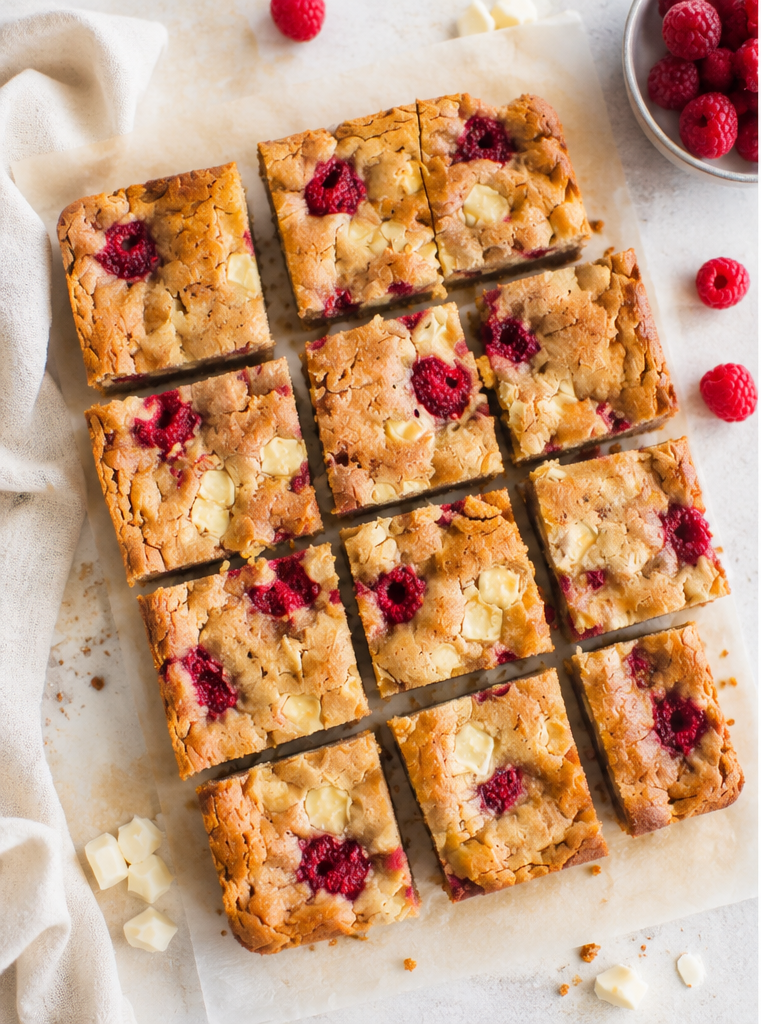 White chocolate raspberry blondies with browned butter and juicy raspberries