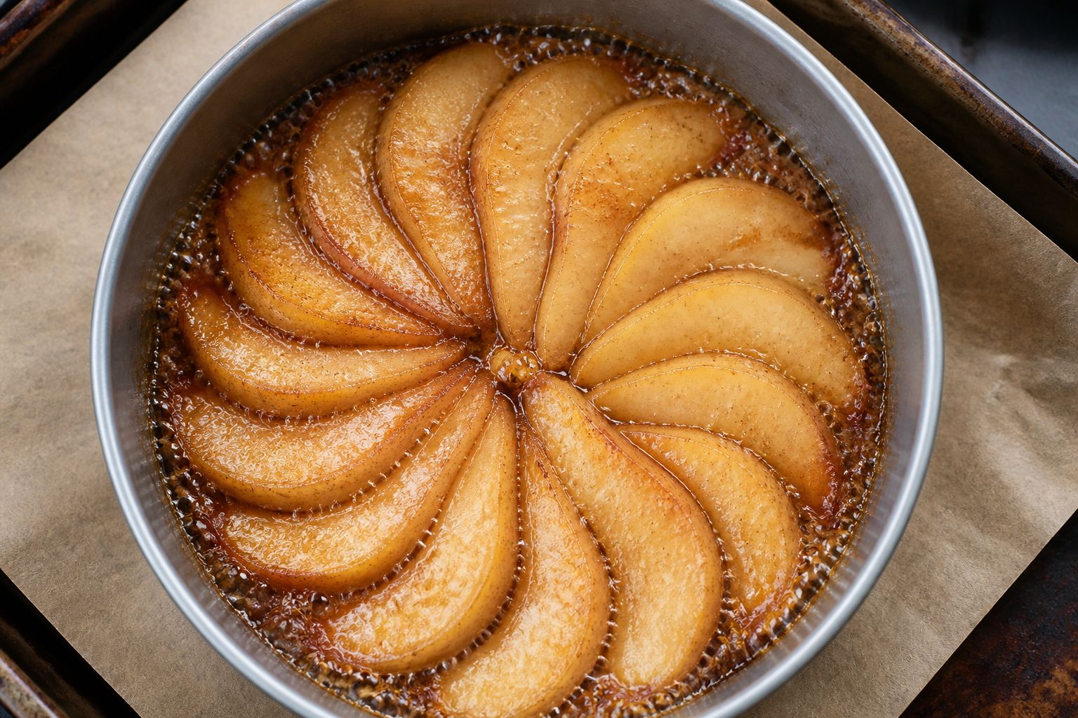 Caramelizing pear slices in the pan with brown sugar-butter syrup